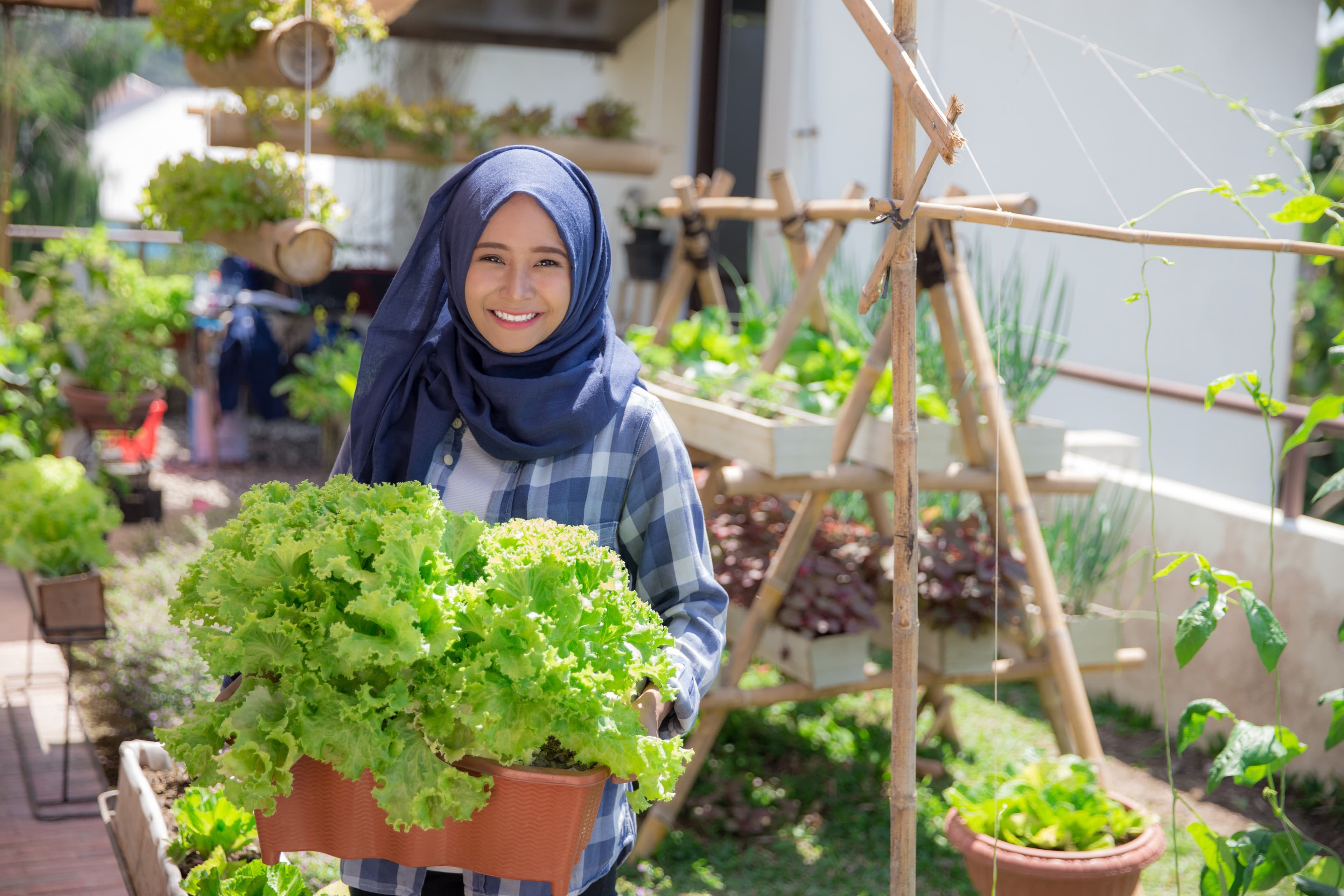 Woman holding fresh produce