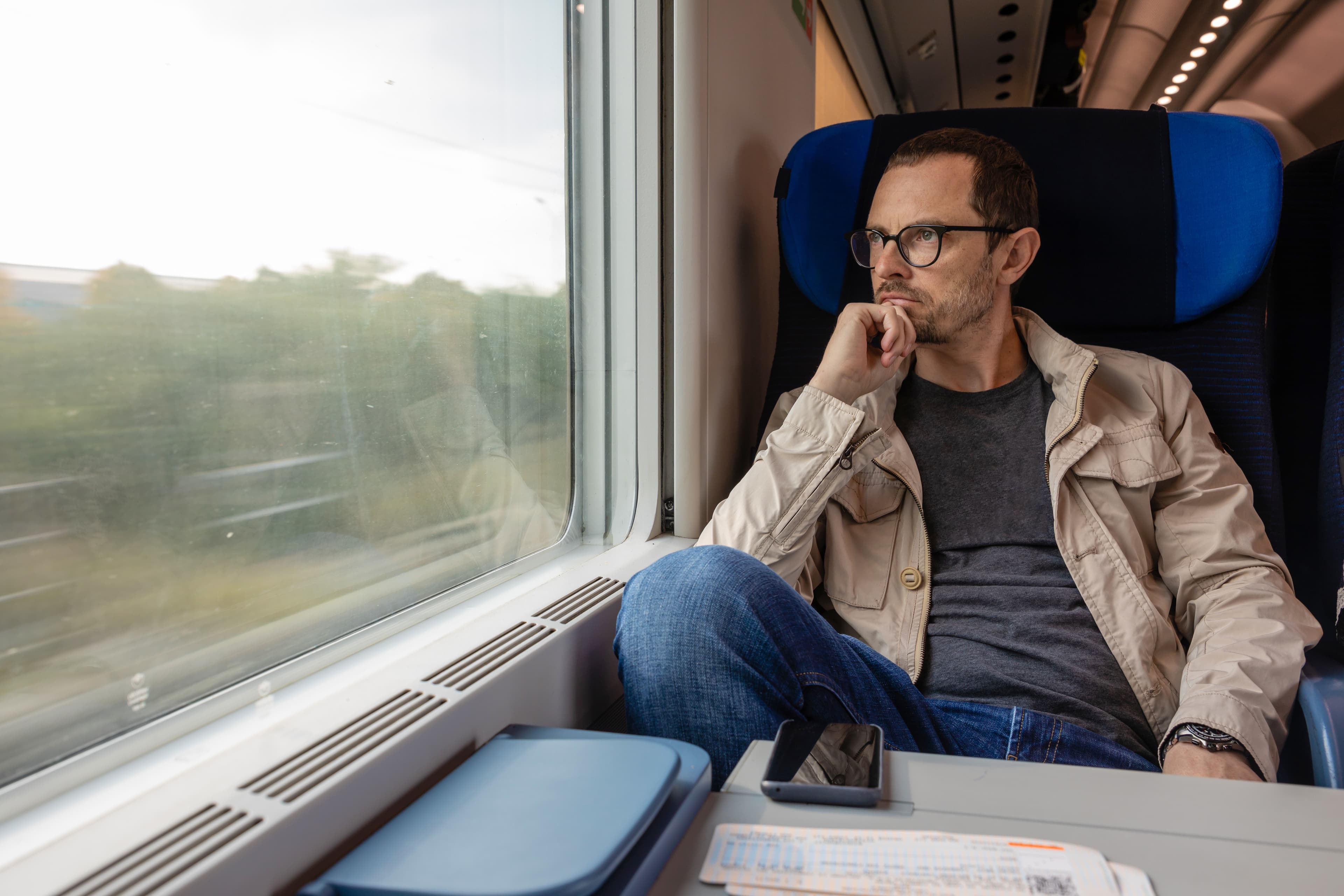 Person travelling by train